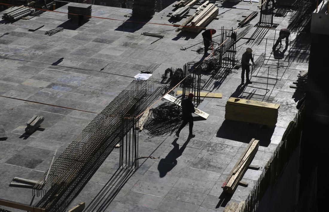 Treballadors del sector de la construcció en una obra.